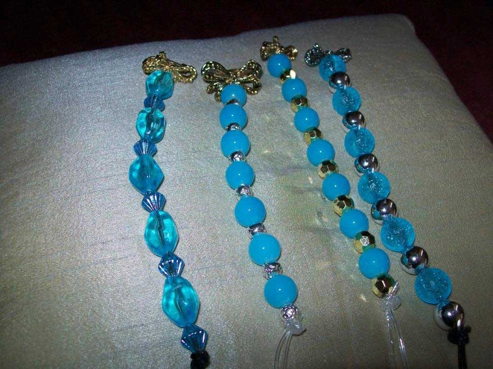 Blue beads with gold silver brooches