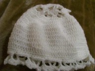 Crochet cap with lace insert. In cotton/silk or acrylic.