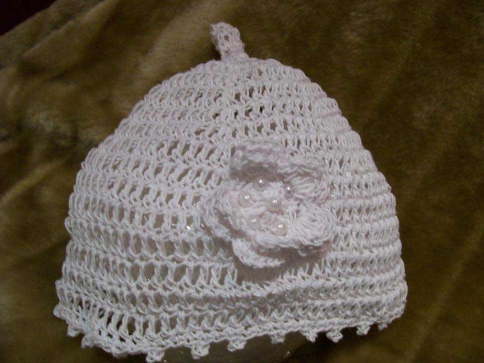 Crochet silk cap with stalk and flower n beads. In silk or cotton.